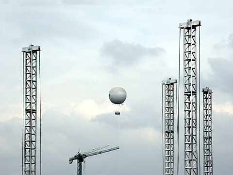 Cranes and hot-air balloon